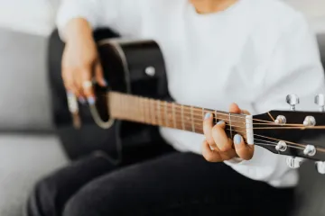 how long does it take to learn to play guitar